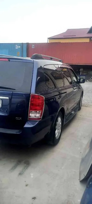 Автомобиль КИА карниваль Автомобиль КИА карниваль