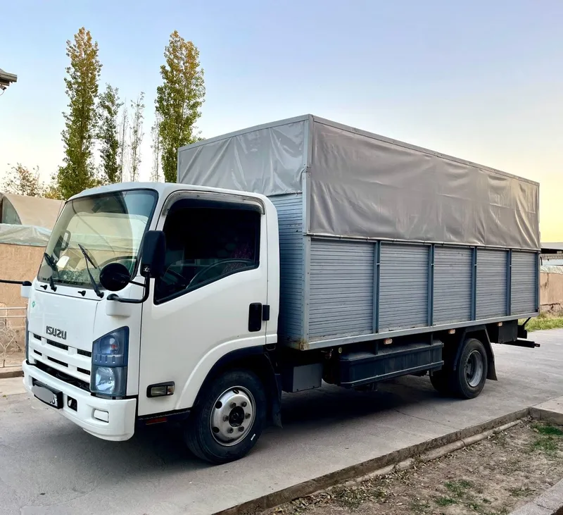 ISUZU Бортовой с тентом — фото 5