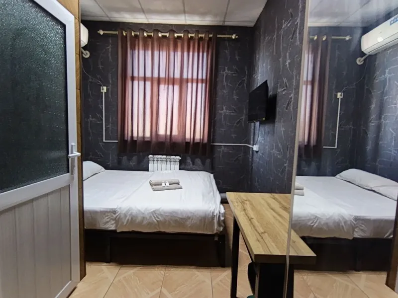 Famili hotel oilavi mexmonxona 1