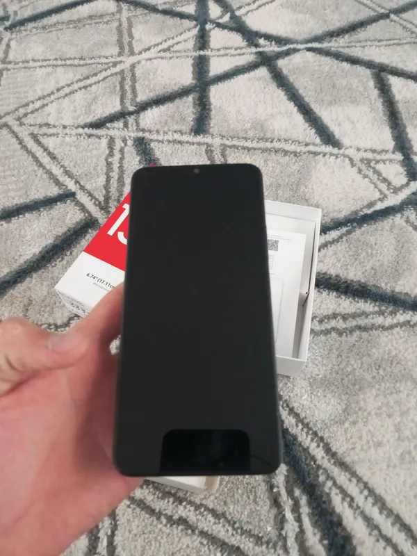redmi 13 c holati yaxshi kamerada chiziğ bor