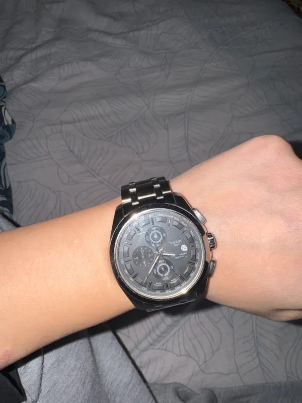 мужские наручные часы Tissot серии Couturier 1853