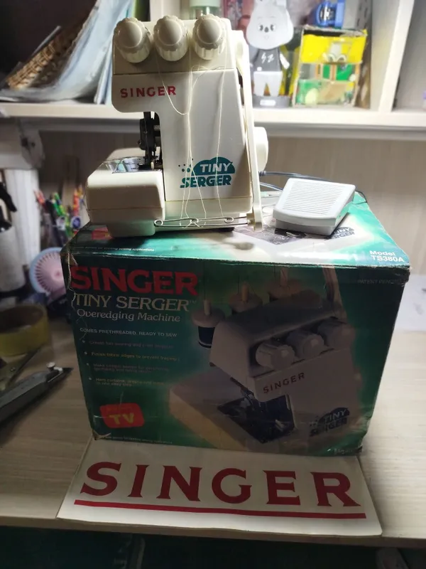Оверлок б/у SINGER