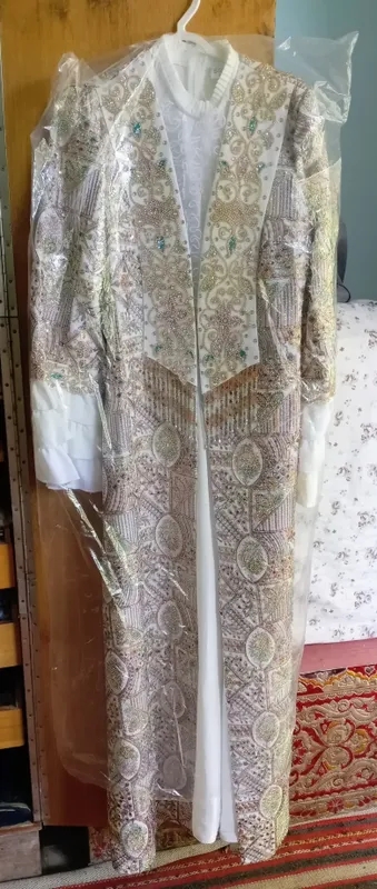 Kelinchaklar uchun ansambl va qalpoq. Holati deial 1