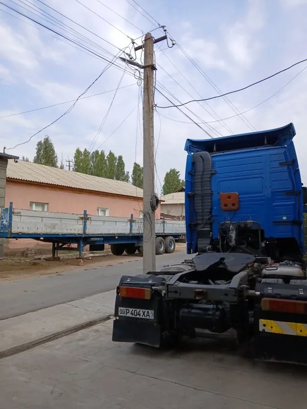 Volvo FH12 pirisepi bilan 4 Volvo FH12 pirisepi bilan 4