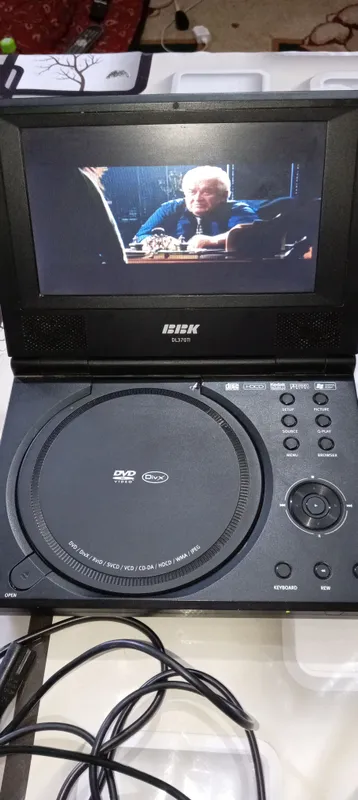 DVD BBK в хорошем состоянии зарядка долго держит. 1