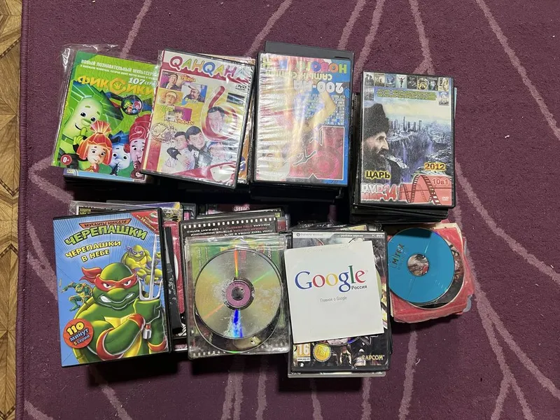 DVD диски, огромная куча