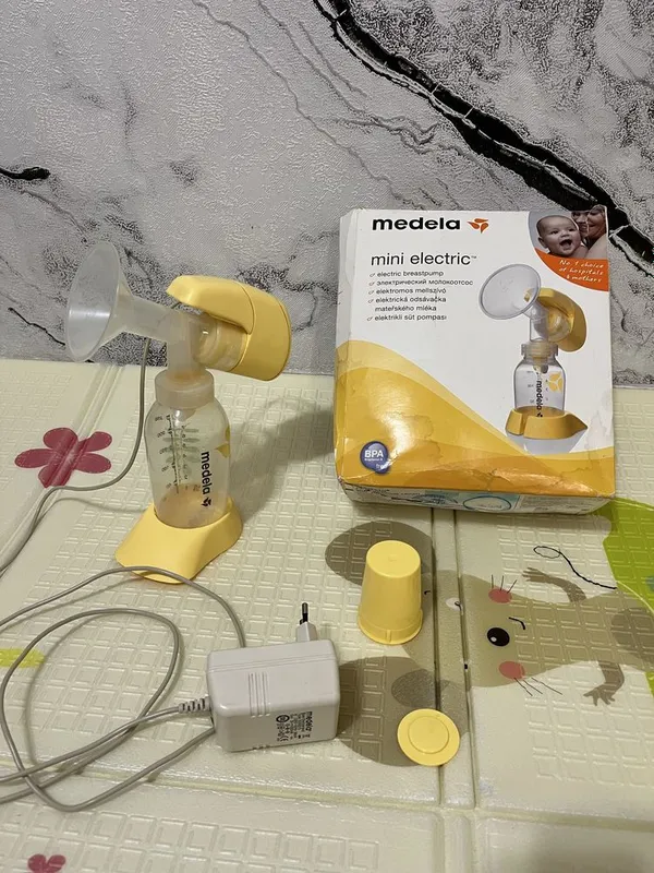 Молокоотсос medela