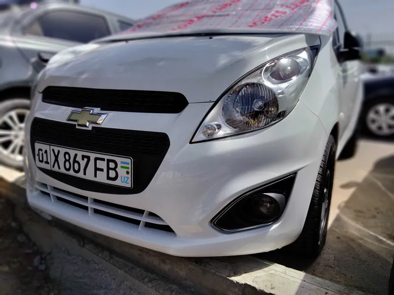 Chevrolet Spark beliy — фото 2