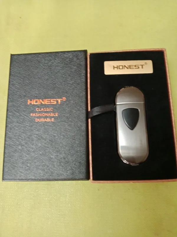 Продам 2 пары зажигалки б/у одна оригинал Honest электронная зарядка з — фото 1