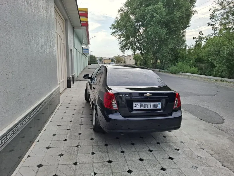 Chevrolet Lacetti qora 2019 yil 160.000 km masofa bosgan holati yahshi — фото 1 Chevrolet Lacetti qora 2019 yil 160.000 km masofa bosgan holati yahshi — фото 1