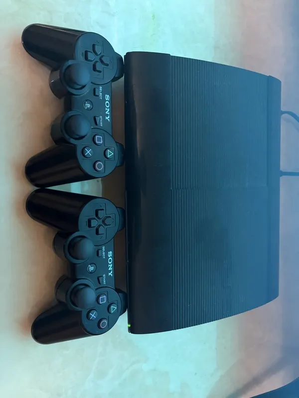 Playstation 3 superslim с playstation move и диски — фото 1