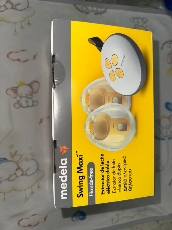 Молокоотсос Medela Swing Maxi Hands free 1 Молокоотсос Medela Swing Maxi Hands free 1