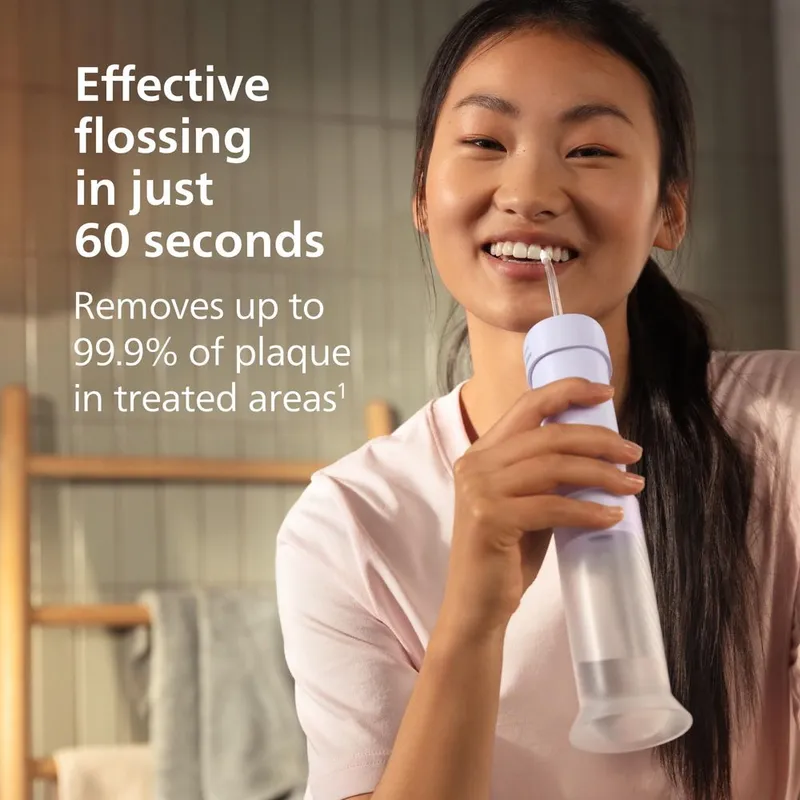 Philips Sonicare HX3333/23 Compact Flosser 1000 - portativ irrigator — фото 2