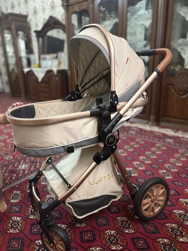 Kolyaska luxmom sotiladi uy ichida haydalgan faqat 1 Kolyaska luxmom sotiladi uy ichida haydalgan faqat 1