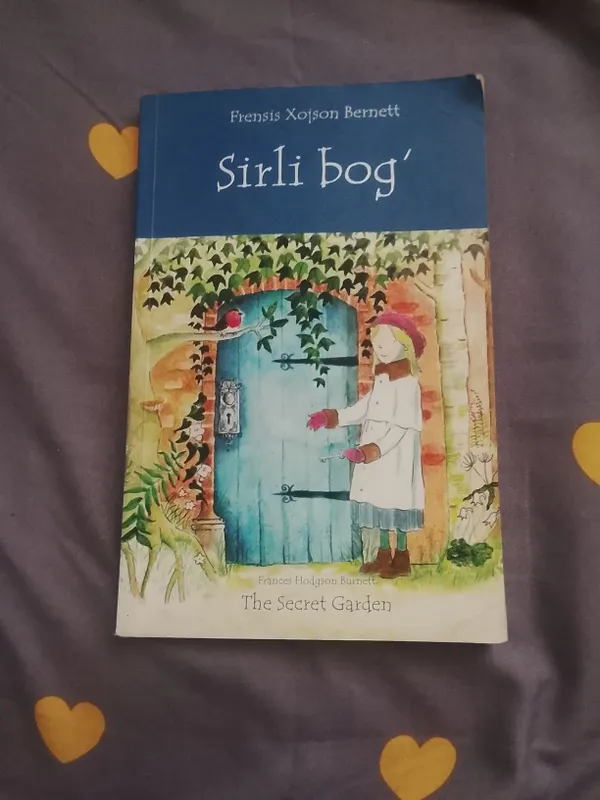 Sirli bogʻ degan kitob. Oʻzbek va Ingliz tilidagi.