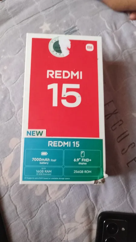 Redmi 15 xotira 256 baterekasi 7000 holati yangi