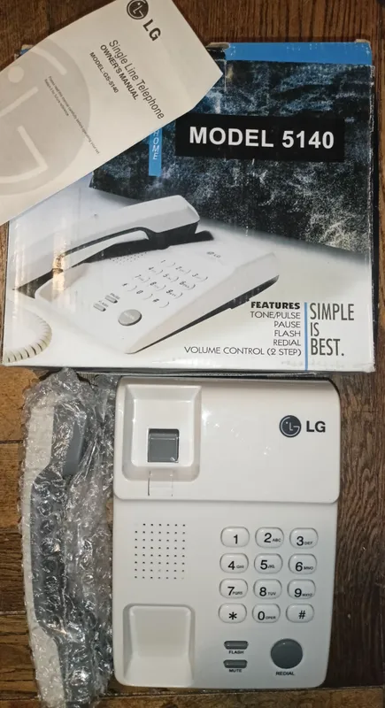 LG simli telefon, yangi. LG simli telefon, yangi.
