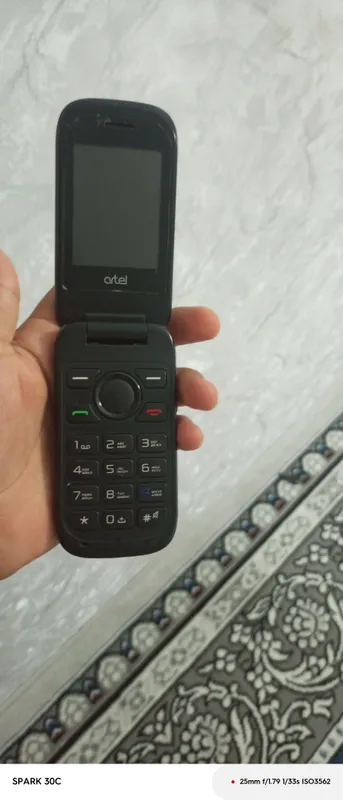телефон: Artel 1