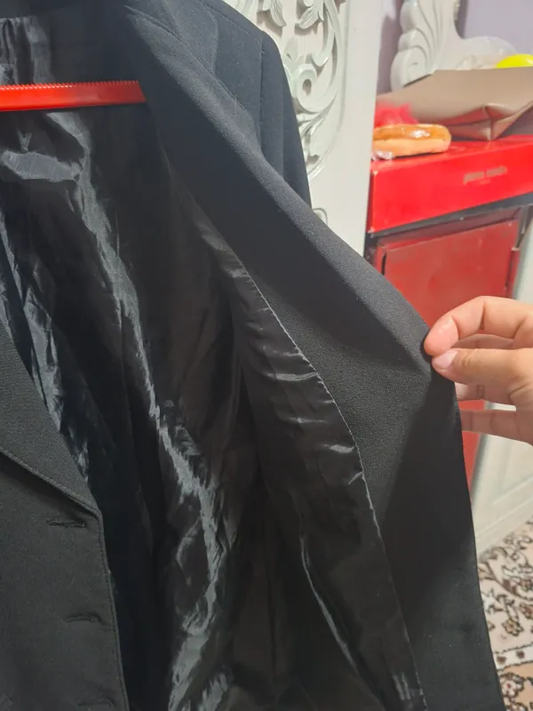 Kastyum qora. 50 52 razmerda. Sifati a‘lo darajada 2