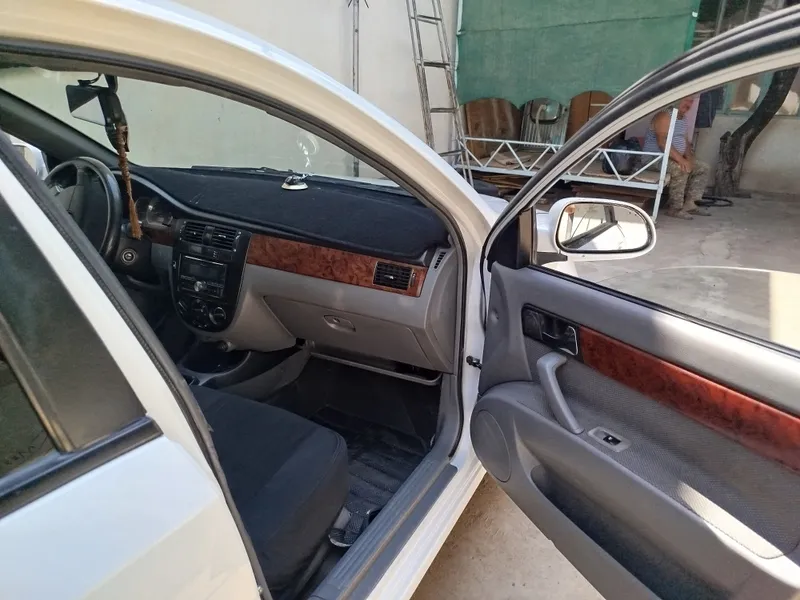 lacetti 1.8 2011 г. 6