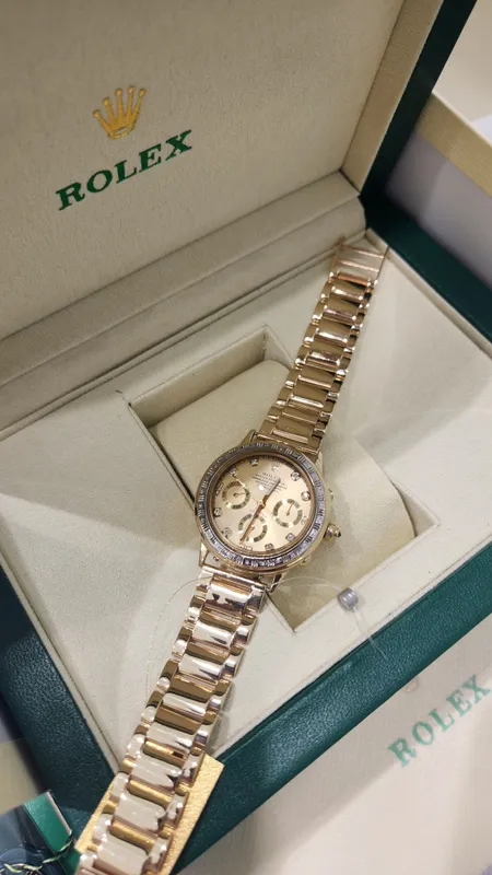 Женские золотые часы Rolex.