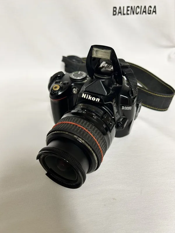 Nikon D3000 фотоаппарат