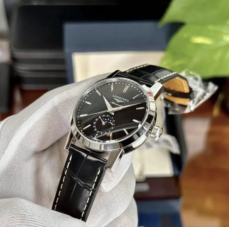 Швецарские часы фирмы Longines, механика с автоподзаводом — фото 1