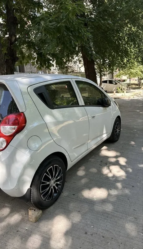 Продаётся Chevrolet Spark 1.25 состояние идеальное. — фото 1