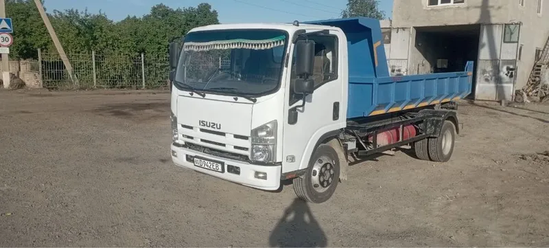 Isuzu avtobusdan taxlangan gruzavoy 2014 — фото 3