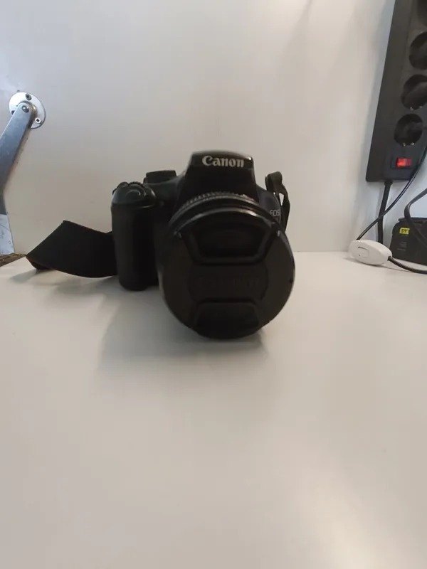 Продам фотоаппарат Canon ds126291 с опективом 18-55мм 7