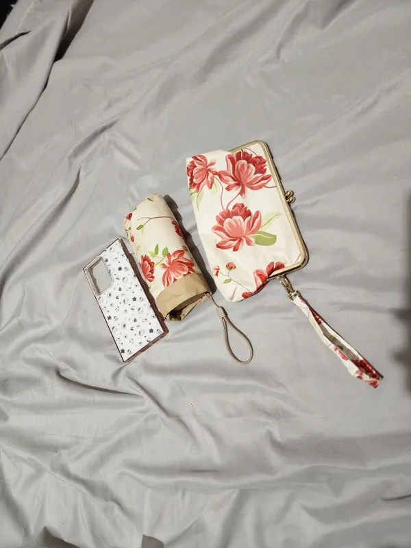 sig'imi telefon kattaligidek soyabon