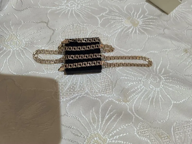 Tilla zanjir, bilaguzuk 585 1