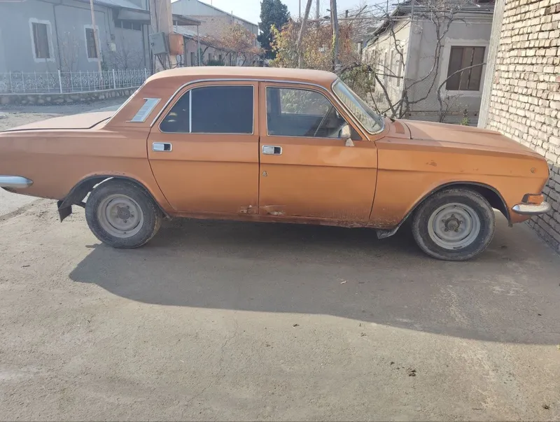 Волга 2410 золотой 2