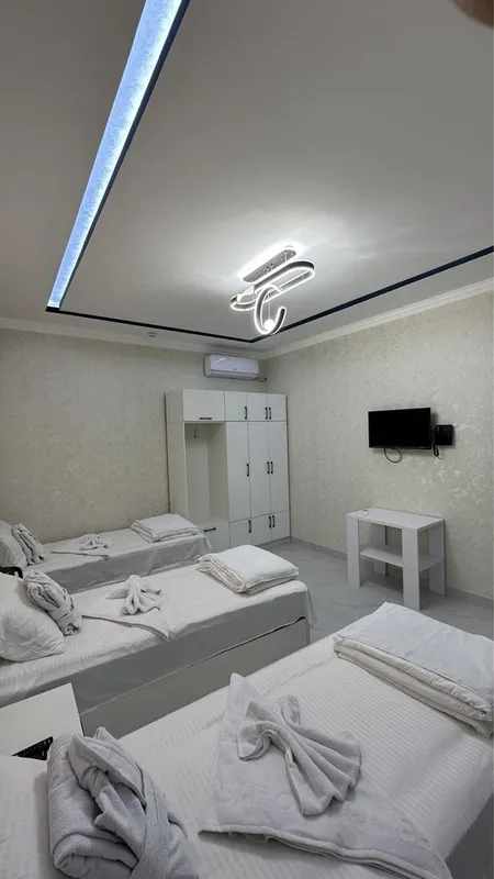 Saroy Hotel lux room mehmonhona 3