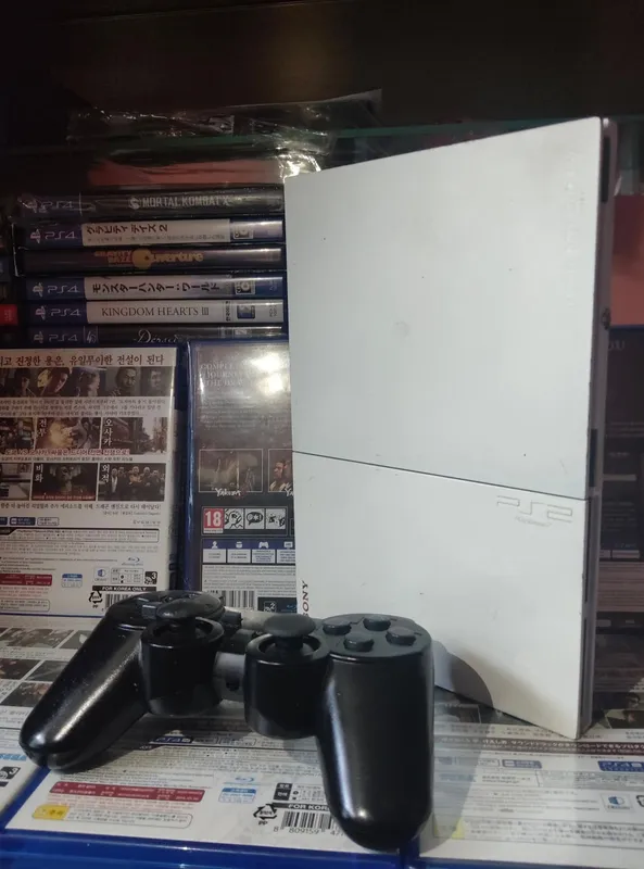 Playstation 2 slim + o'yinlar 64gb