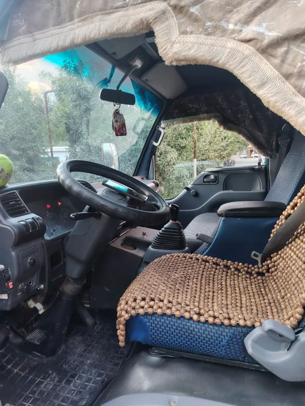 Isuzu NQR 71 PL sotiladi xolati yaxshi — фото 2