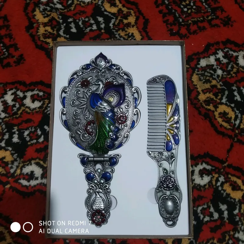 Nuqradan yasalgan qol mehnati oyna bilan tarogi