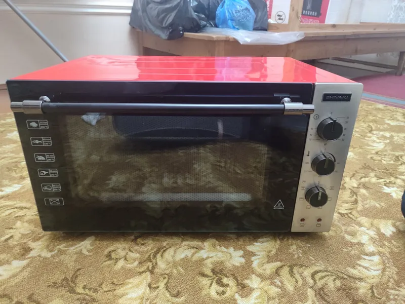 Электрическая мини печь Shivaki MD 4218 почти новая