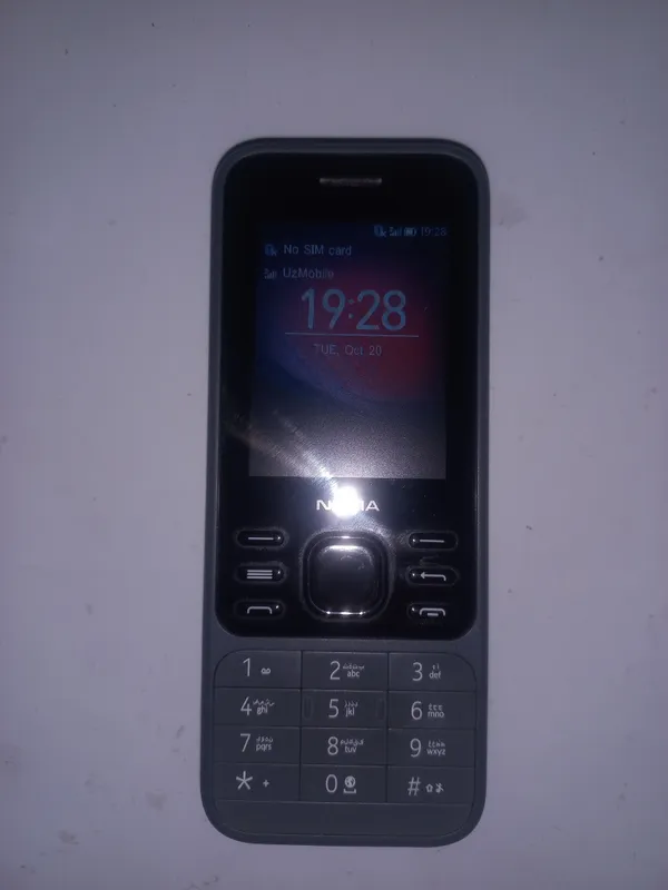 Телефон 6300 2