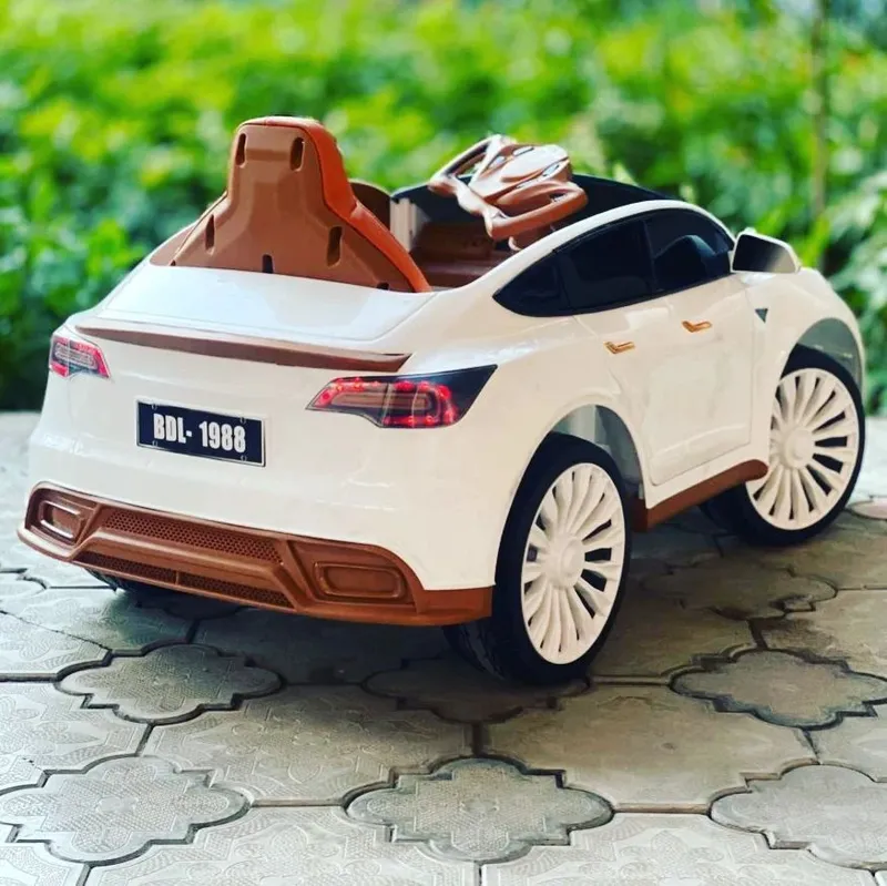 Tesla Model S Plaid детская машина, электромобиль — подарок для детей 2 Tesla Model S Plaid детская машина, электромобиль — подарок для детей 2