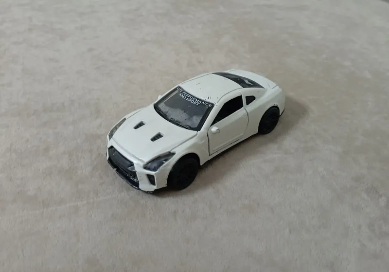 Железная машинка Nissan gtr am3 sport игрушка.