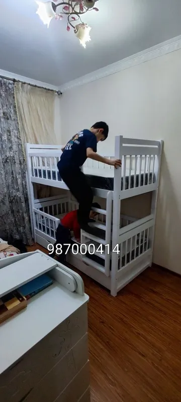 Двухьярусная кроватиь