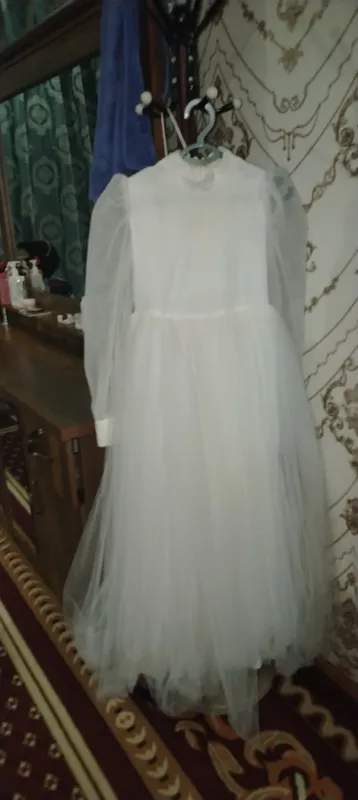 birmarta kiyilgan yangidek