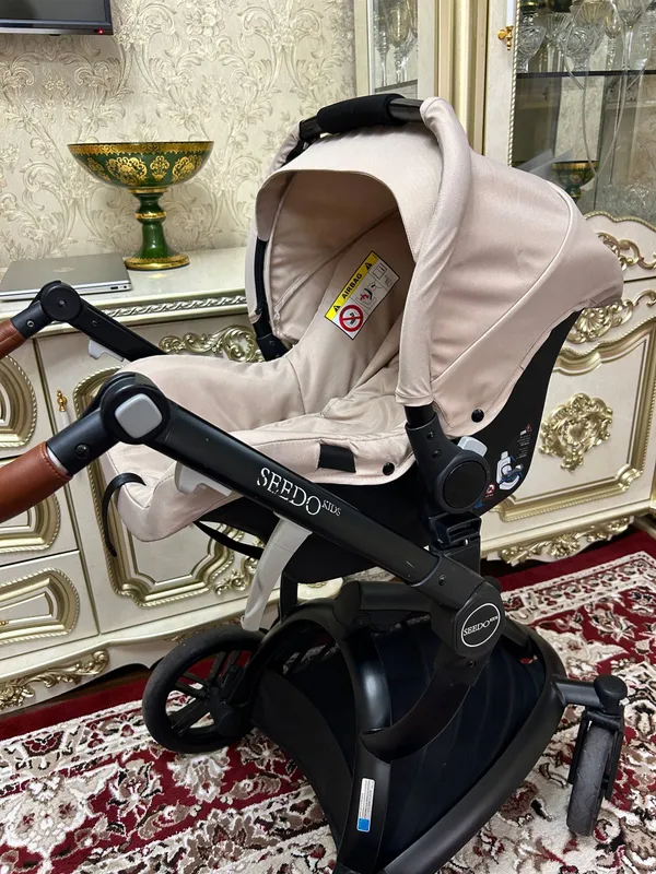 Детская коляска + автокресло "Seedo Kids" 4 Детская коляска + автокресло "Seedo Kids" 4