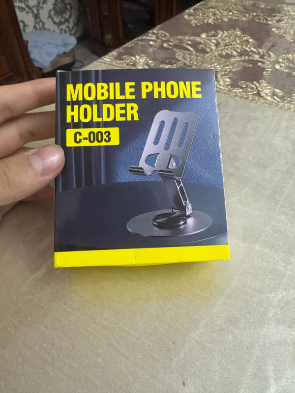 Holder universal telifon ushlagich