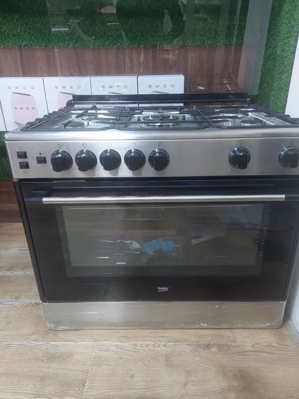 комбинированная кухонная плита бренда Beko. 3