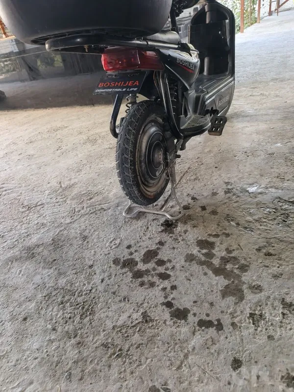 Sukuter elektronik bir zaryad bilan 60 km 4 Sukuter elektronik bir zaryad bilan 60 km 4