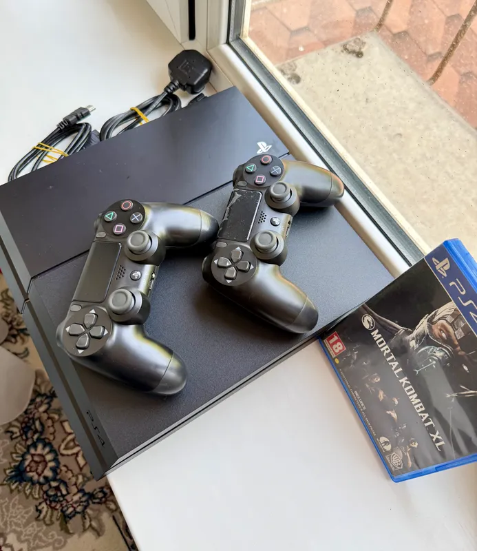 PlayStation 4 Fat 500GB + Mortal Kombat XL 1 PlayStation 4 Fat 500GB + Mortal Kombat XL 1