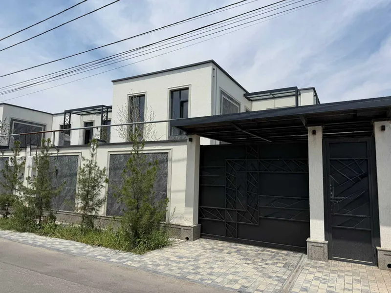 Продаётся новый пятикомнатный коттедж в Ташкенте (стиль минимализм)