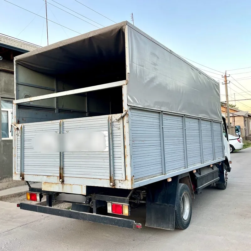 ISUZU Бортовой с тентом — фото 2